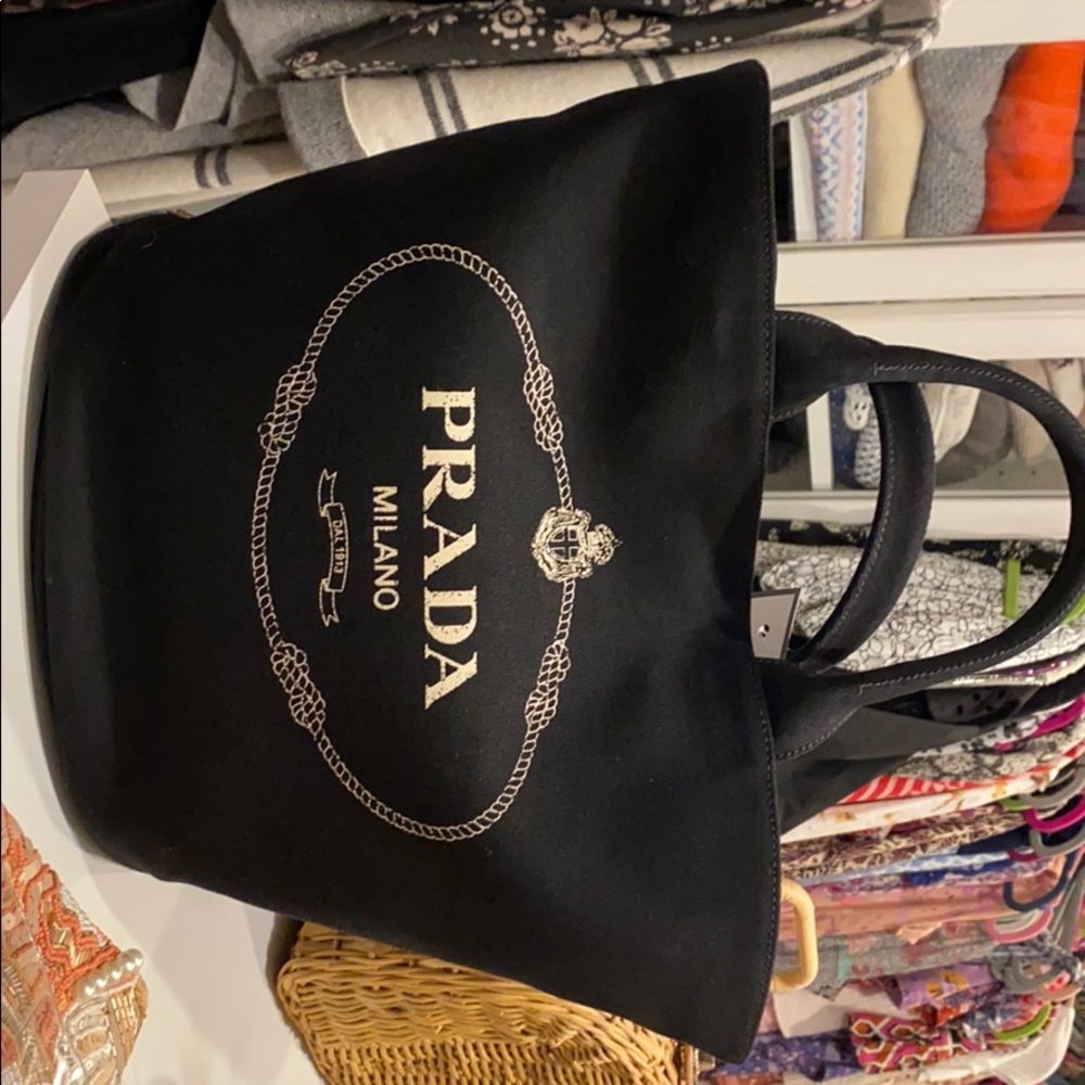 Black canvas Prada bag with tags